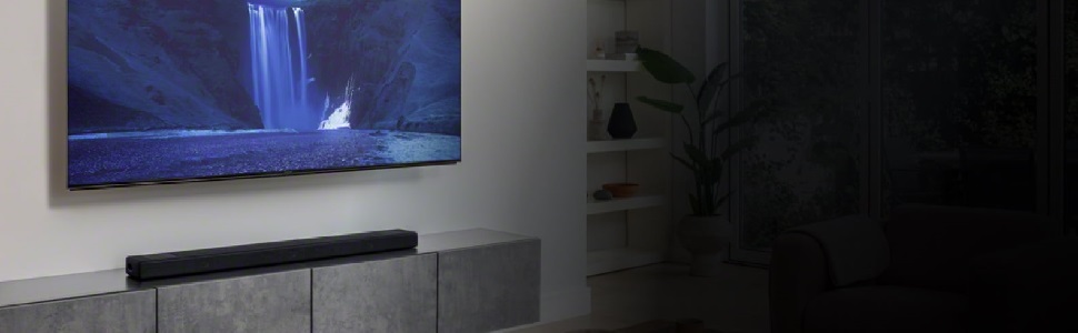Sony HT-A5000 on tv stand below tv mounted to wall