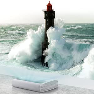 Ocean waves hitting a lighthouse